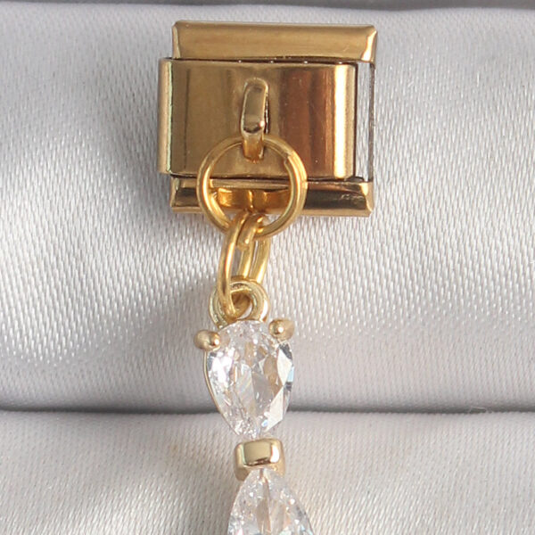 Çelik Gold Renk Sallantı Zirkon Taşlı Kurdele Model Nomination Charm