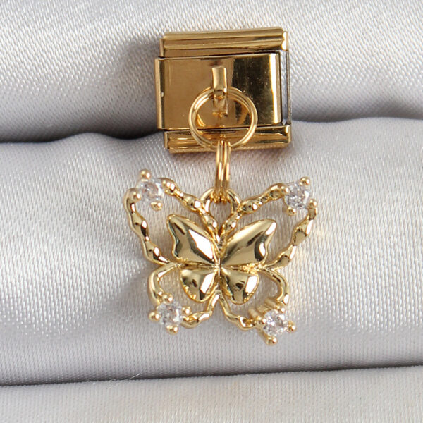 Çelik Sallantılı Zirkon Taşlı Kelebek Model Gold Renk Nomination Charm