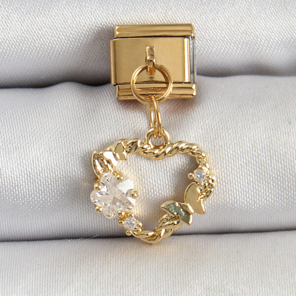 Çelik Sallantılı Zirkon Taşlı Kalp Model Gold Renk Nomination Charm