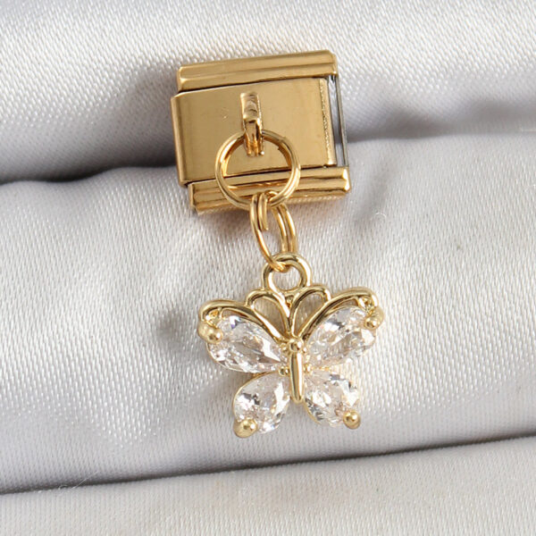 Çelik Sallantılı Zirkon Taşlı Kelebek Model Gold Renk Nomination Charm