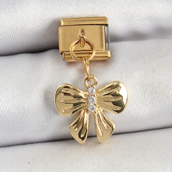 Çelik Sallantılı Zirkon Taşlı Fiyonk Model Gold Renk Nomination Charm