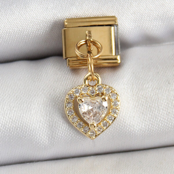 Çelik Sallantılı Zirkon Taşlı Kalp Model Gold Renk Nomination Charm