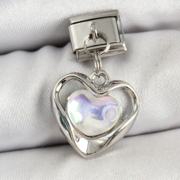 Çelik Sallantılı Zirkon Taşlı Kalp Model Gümüş Renk Nomination Charm