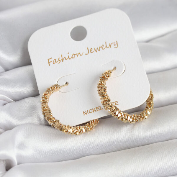 Gold Renk Tırtık Model Küpe