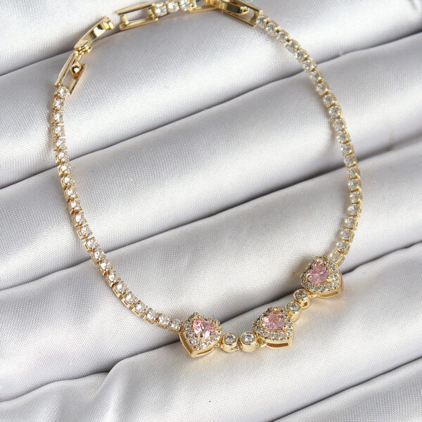Sıralı Pembe Kalp Figürlü Zirkon Taşlı Gold Renk Bileklik