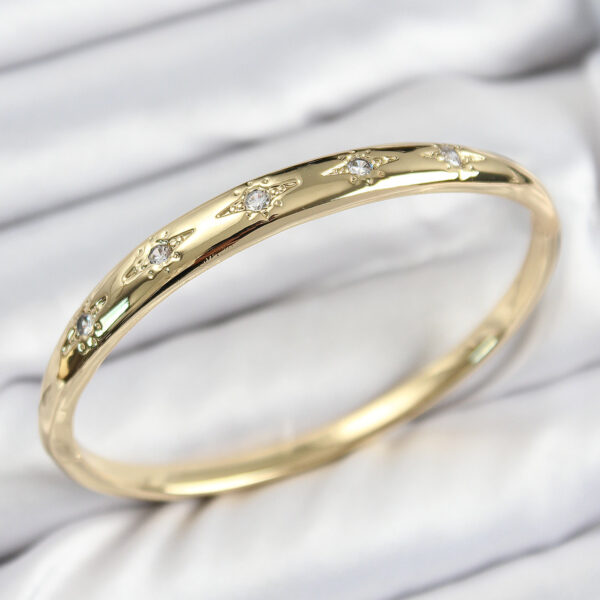 Zirkon Taşlı Kutup Yıldızı Model Gold Renk Kelepçe